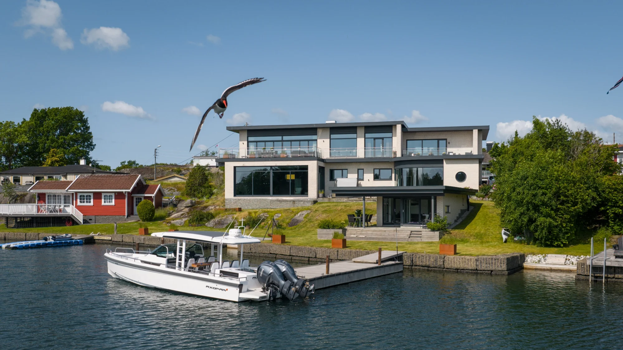 Rålekker villa med lang strandlinje